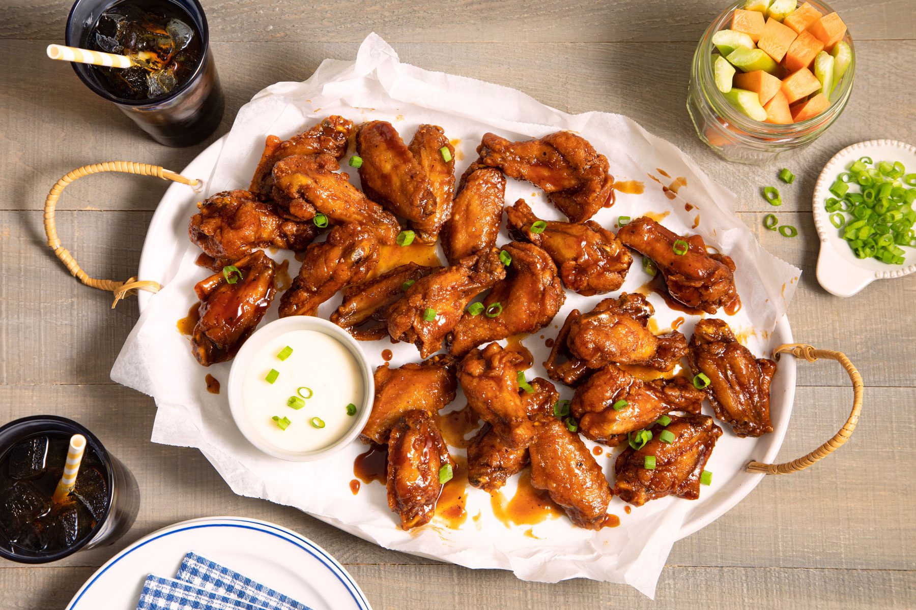 Honey Barbecue Chicken served in a plate with glass of soda on the side