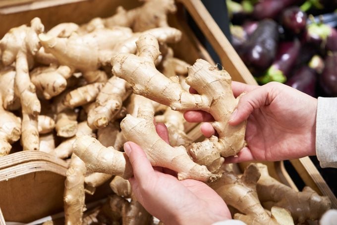 Ginger in hands of in store