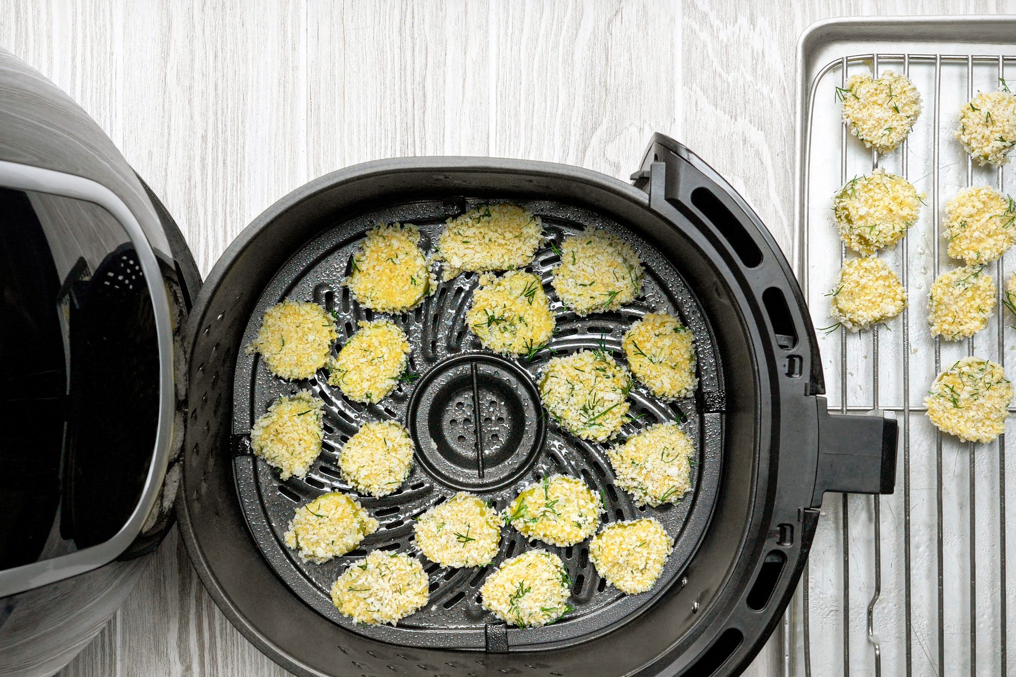 overhead shot of pickles in air fryer
