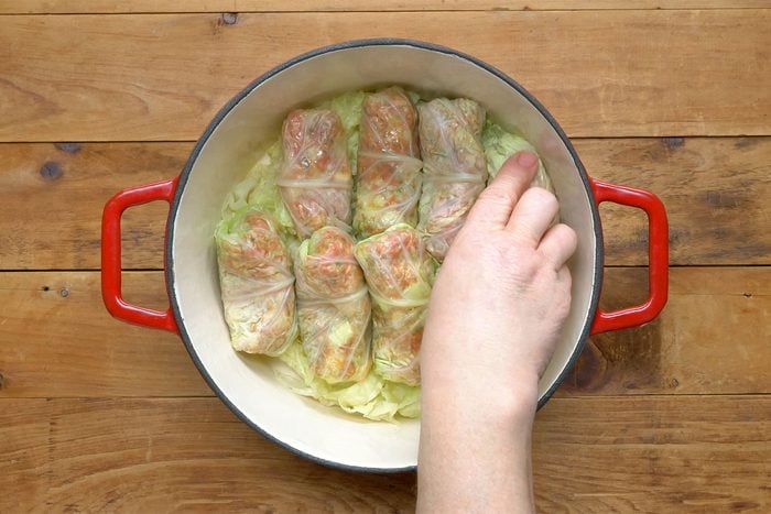 overhead shot of cabbage rolls in a dutch oven