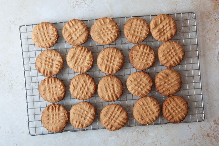 Taste of Home Gluten-Free Peanut Butter Cookies cooling on. a wire cooling rack
