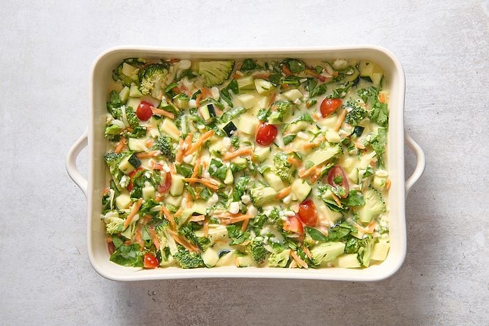 Casserole poured into a baking dish ready for the oven