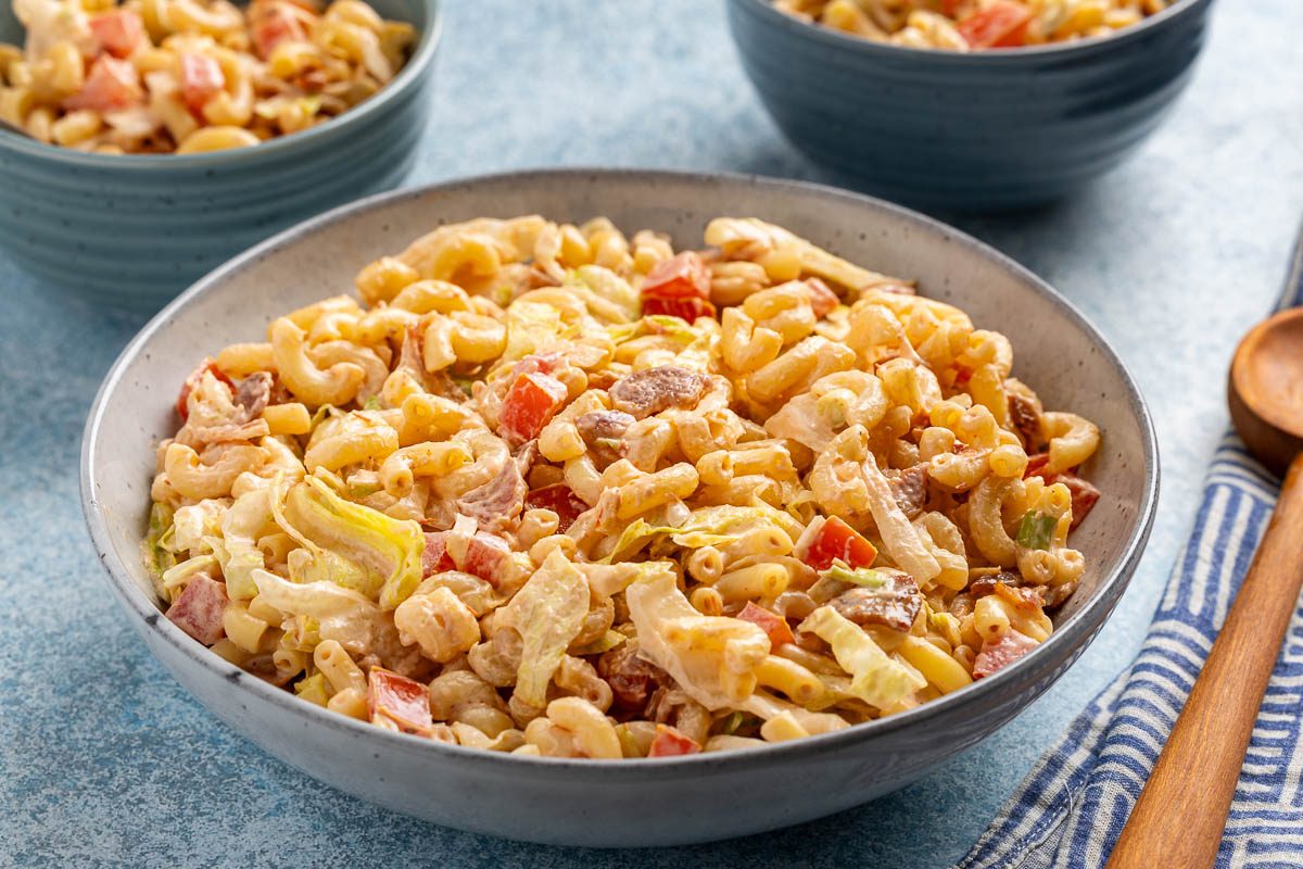 table view close up of BLT pasta salad in a large bowl