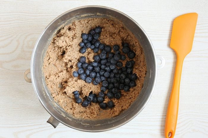 Adding blueberries to oatmeal cookie dough
