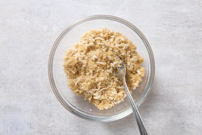 Mixing the topping in a small bowl