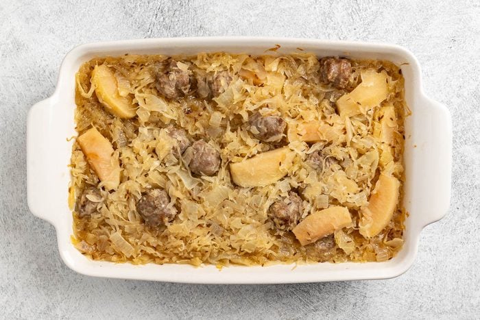 Taste of Home Sauerkraut Casserole recipe photo of the baked casserole in a baking dish.