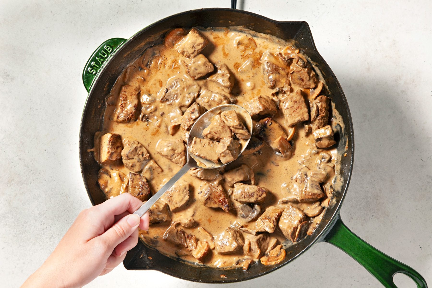 Cook over medium heat until thickened and bubbly, stirring constantly. Add beef mixture.