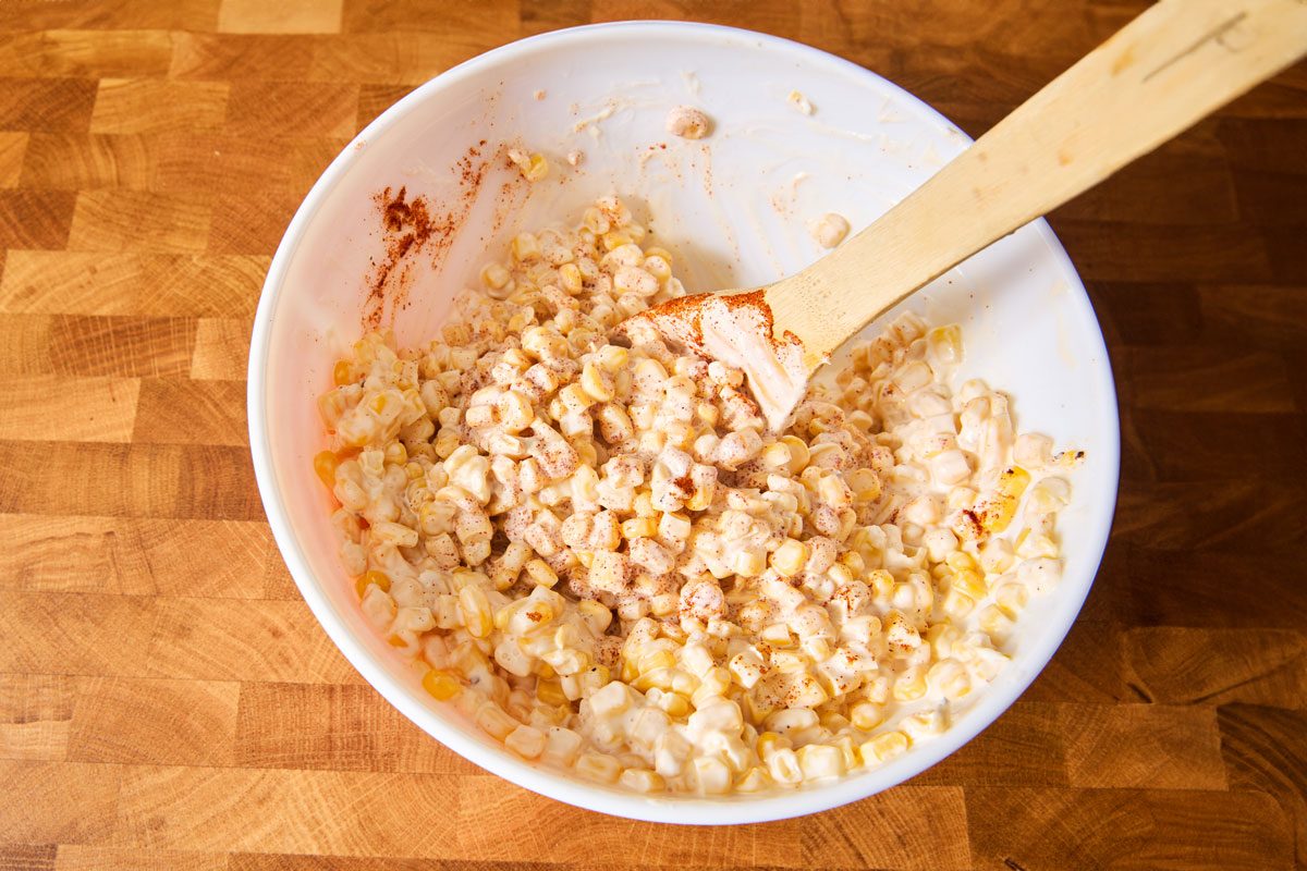 mixing ingredients for Mexican Street Corn Bake