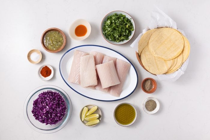 Ingredients for mahi mahi tacos on kitchen counter.