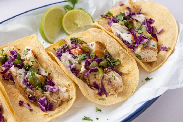 Mahi mahi tacos ready, on serving plate.