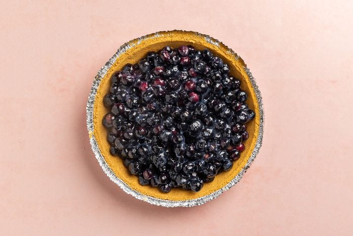 Taste of Home No Bake Blueberry Pie recipe photo of blueberry filing added to the crust.
