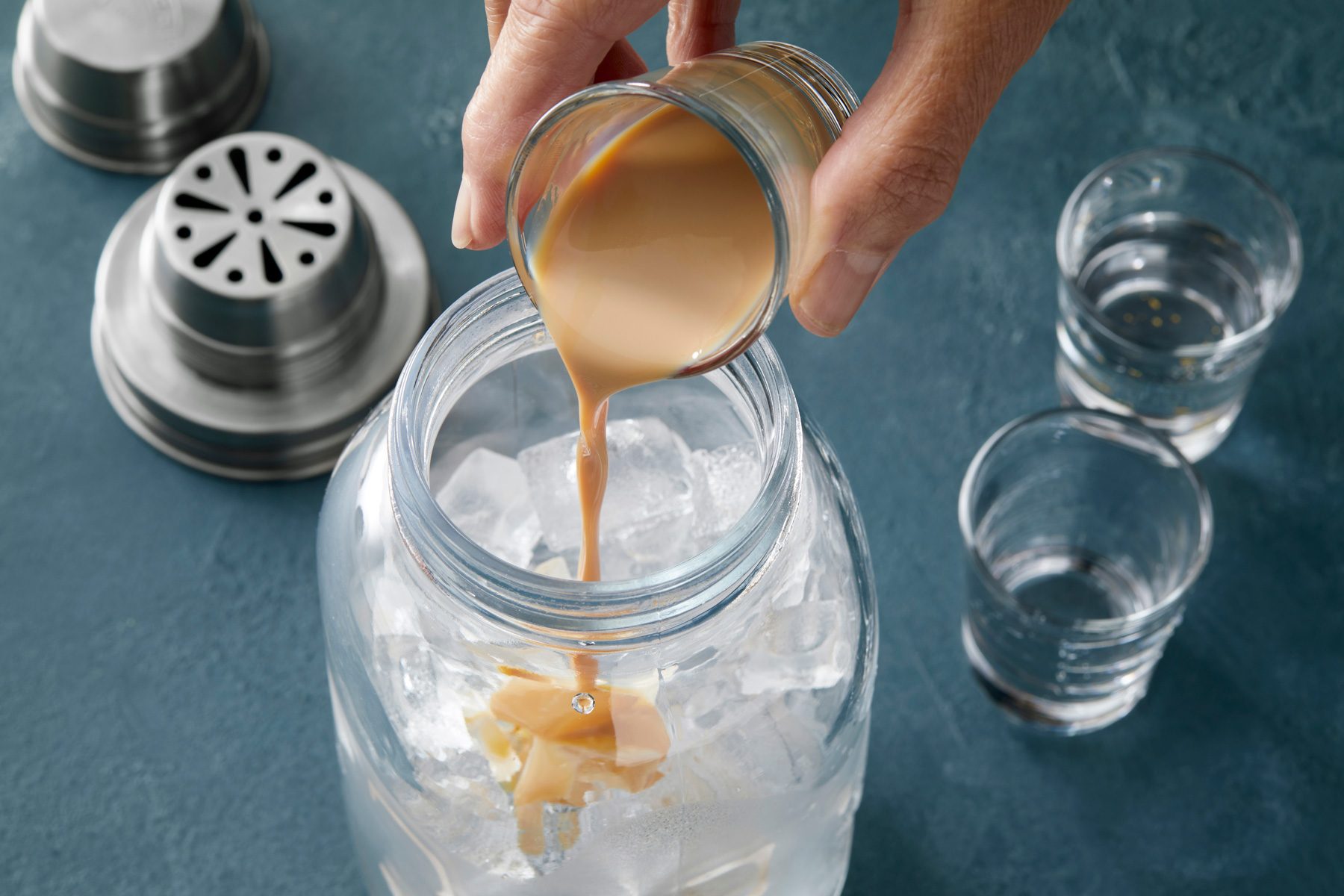 Pour liqueurs into a chilled and/or ice filled cocktail shaker