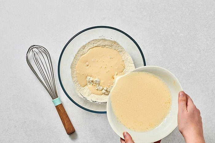 Combining ingredients for buttermilk waffle batter