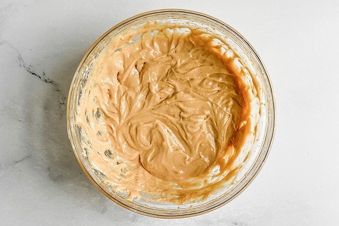 Ingredients for Taste of Home Peanut Butter Cake on a marble surface