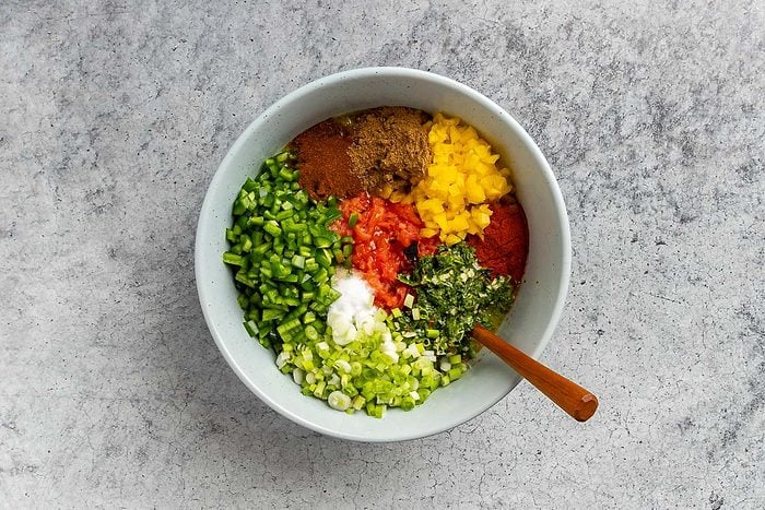 Taste of Home Roasted Salsa Recipe photo of all ingredients in a large bowl.