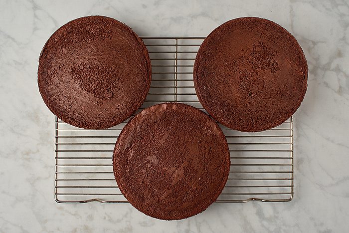 Bake cakes and cool
