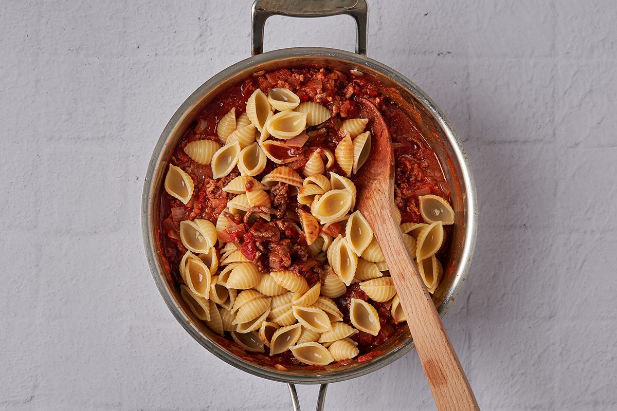 Add pasta to sauce