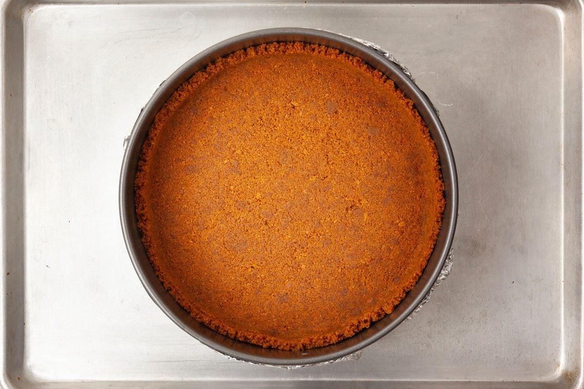 Step 1 of Taste of Home Biscoff Cheesecake is to prepare the crust