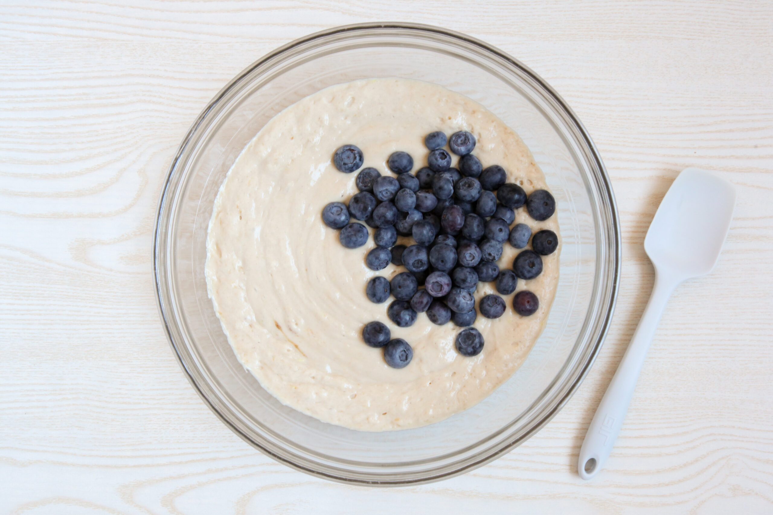 Adding blueberries to muffin batter