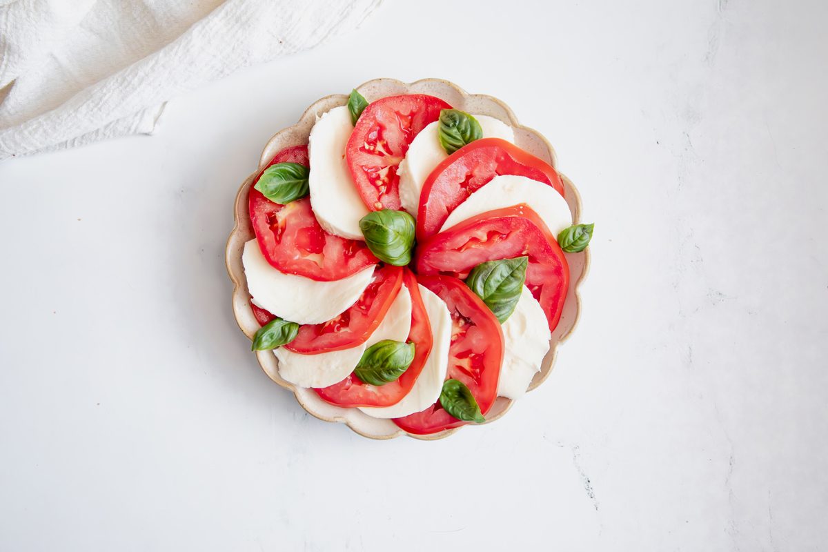 Overhead shot for Taste of Home Caprese Salad before being topped with balsamic dressing.