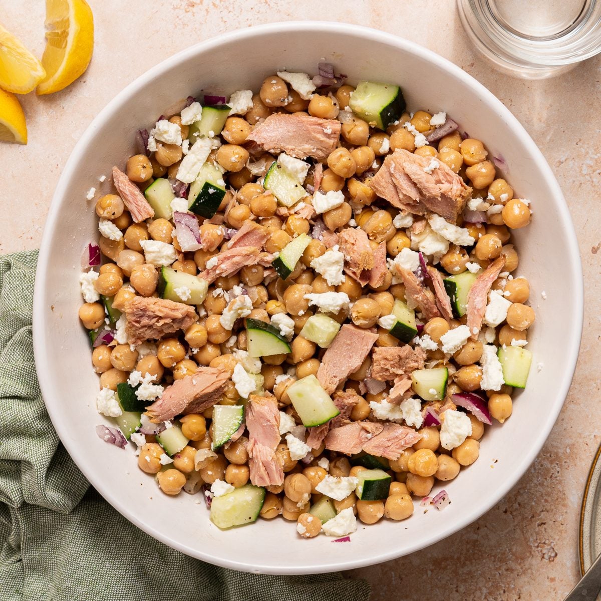 Greek Tuna Salad Mixed Inside Serving Bowl With Lemon