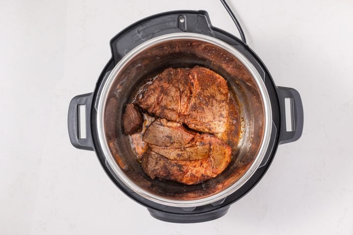 Beef chuck roast browned in instant pot.
