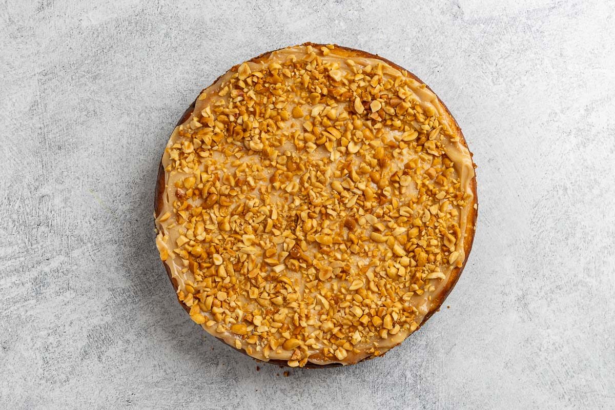 cooled and refridgerated cheesecake with the sides of the pan removed.