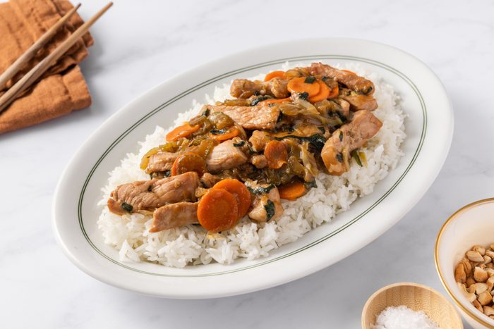 Pork chow mein served over rice.