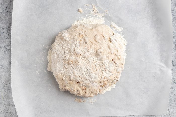 Taste of Home Walnut Raisin Bread photo of the shaped dough on parchment.