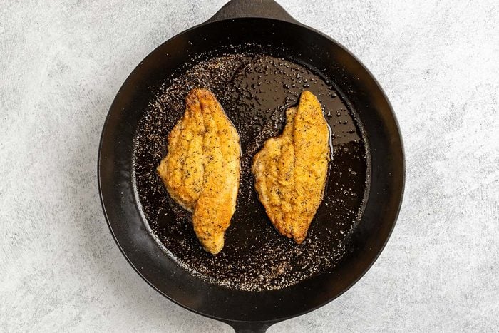 Taste of Home Grilled Catfish photo of cooking the fish.