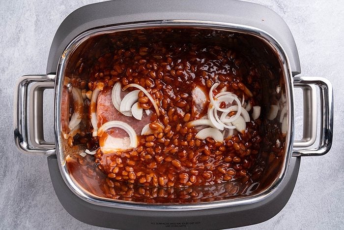 Taste of Home Pork and Beans recipe photo of all the ingredients in the slow cooker.
