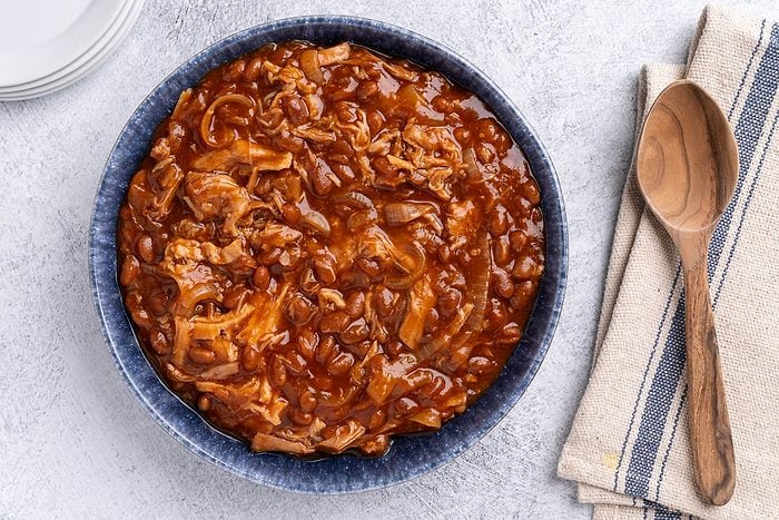 Taste of Home Pork and Beans recipe photo of the finished recipe in a serving bowl.