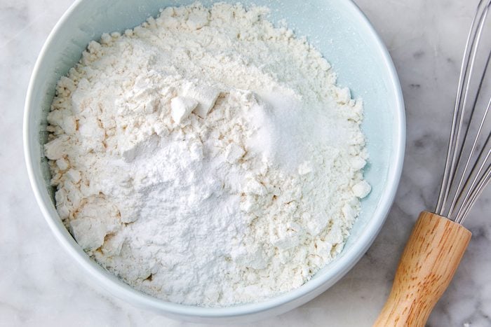 In another bowl, whisk flour, baking powder and salt