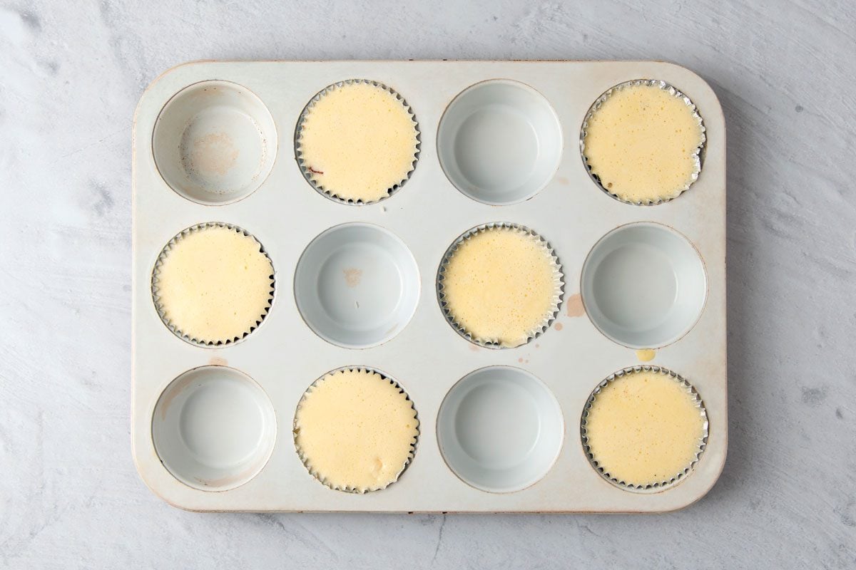 Bake until the eggs puff and are cooked to desired degree of doneness,