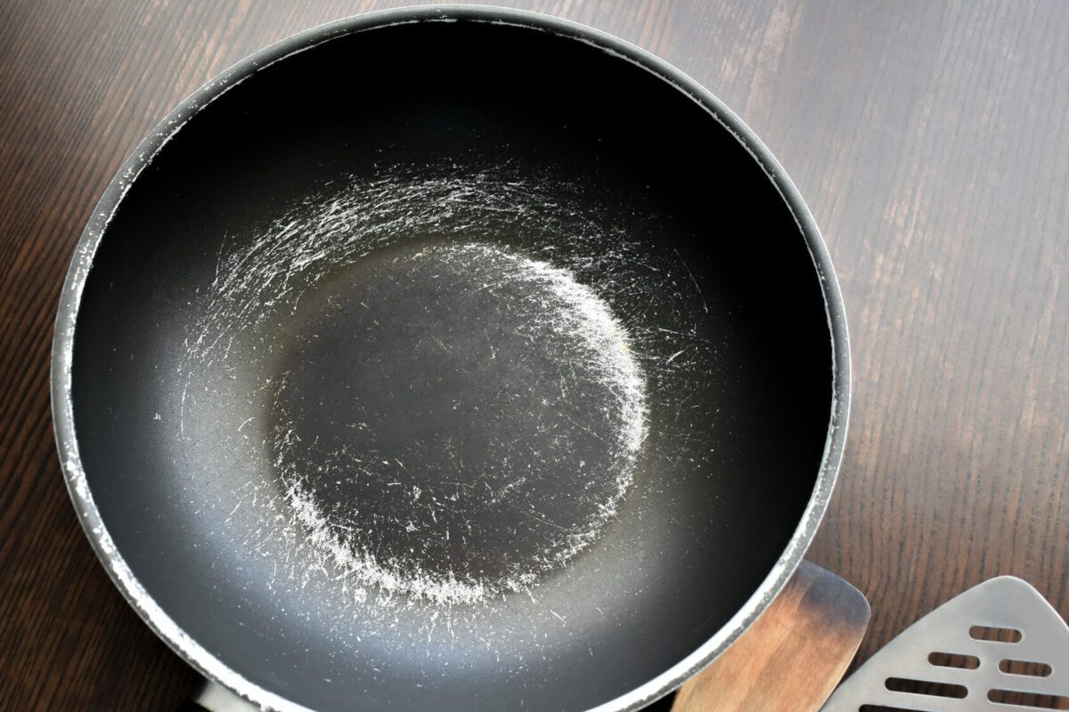 Old scratched non-stick saucepan.