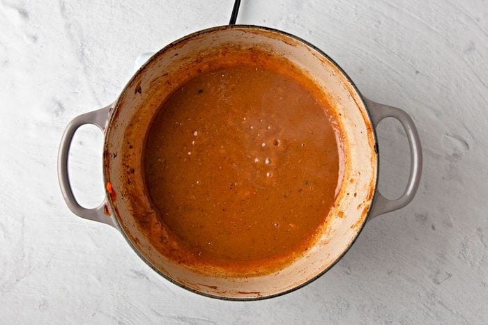 In the Dutch oven, melt butter over medium heat. Stir in flour until smooth. Gradually whisk in pan juices.