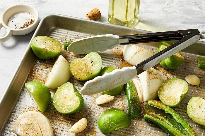 Close-up shot; Preheat oven to 400 degree; Roast until skins begin to brown and vegetables are tender
