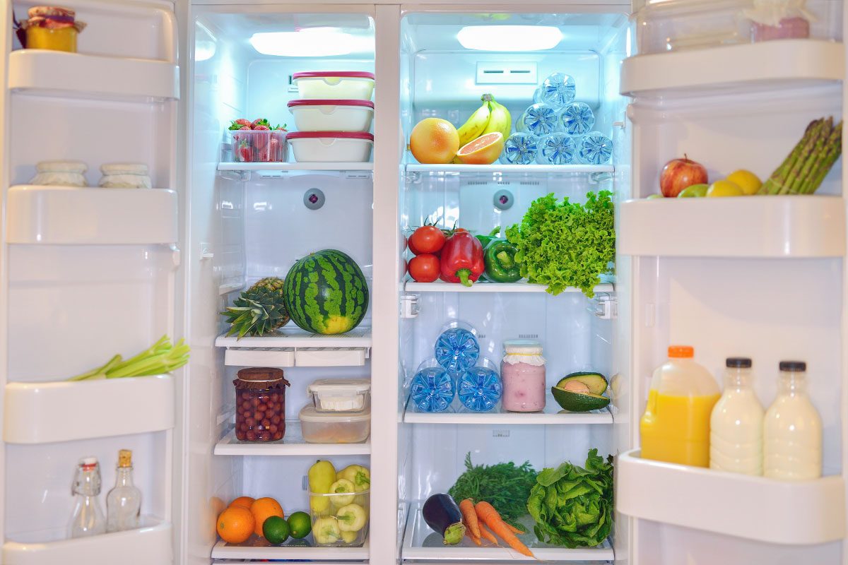 Rerfigerator full with healthy food.
