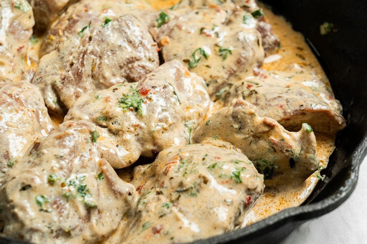 Close up shot of Tenderloin with Herb Sauce;
