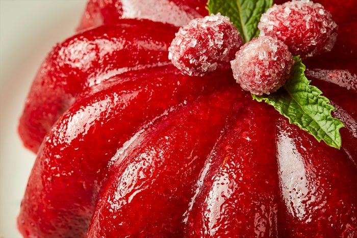 Closeup shot of Molded Cranberry-Orange Salad; served on a platter;