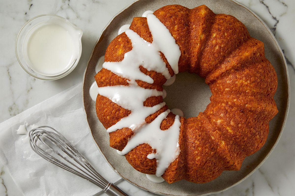 Glazing a Yellow Squash Cake
