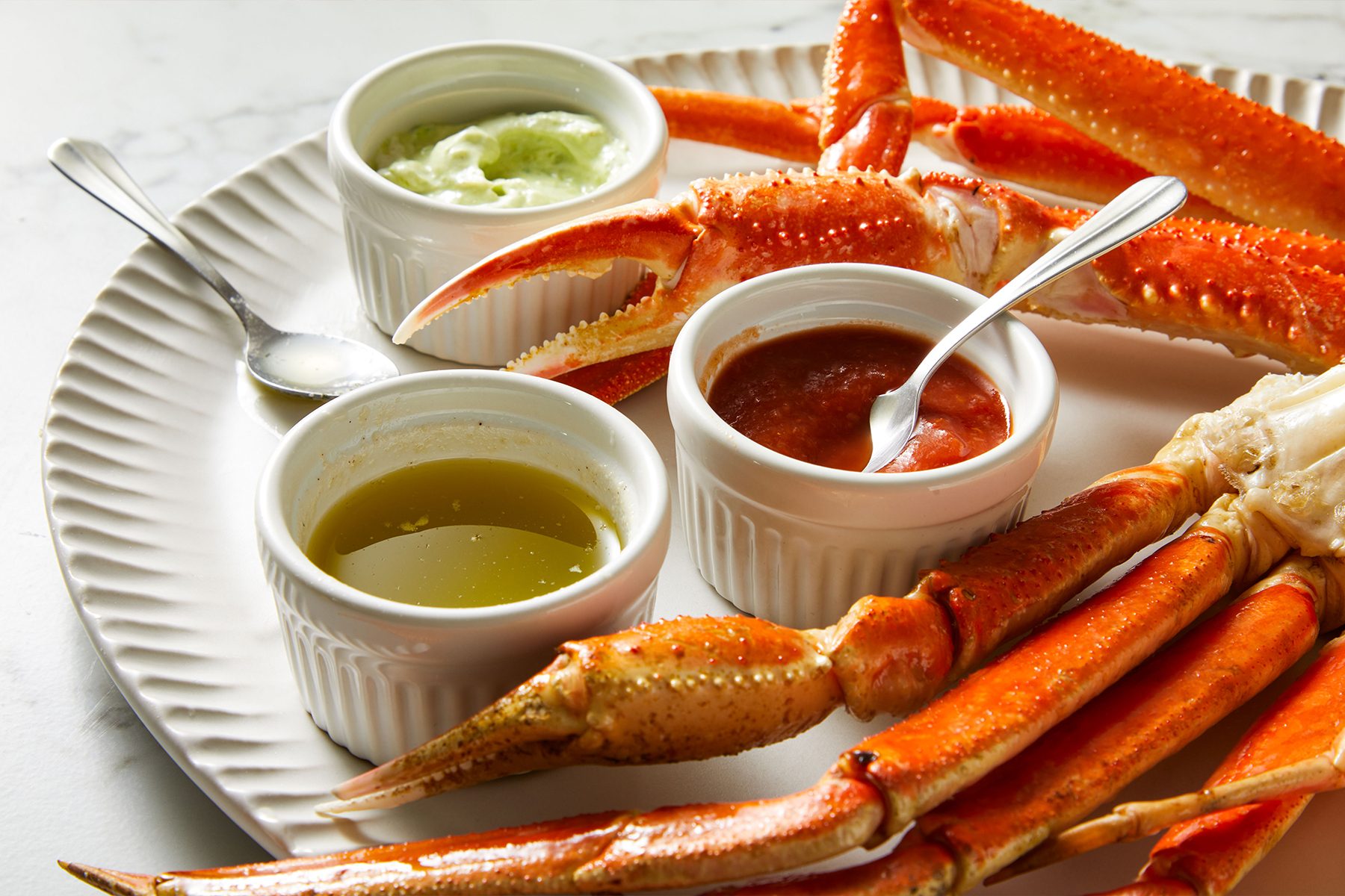 Dipping Sauces For Crab Legs served on a plate
