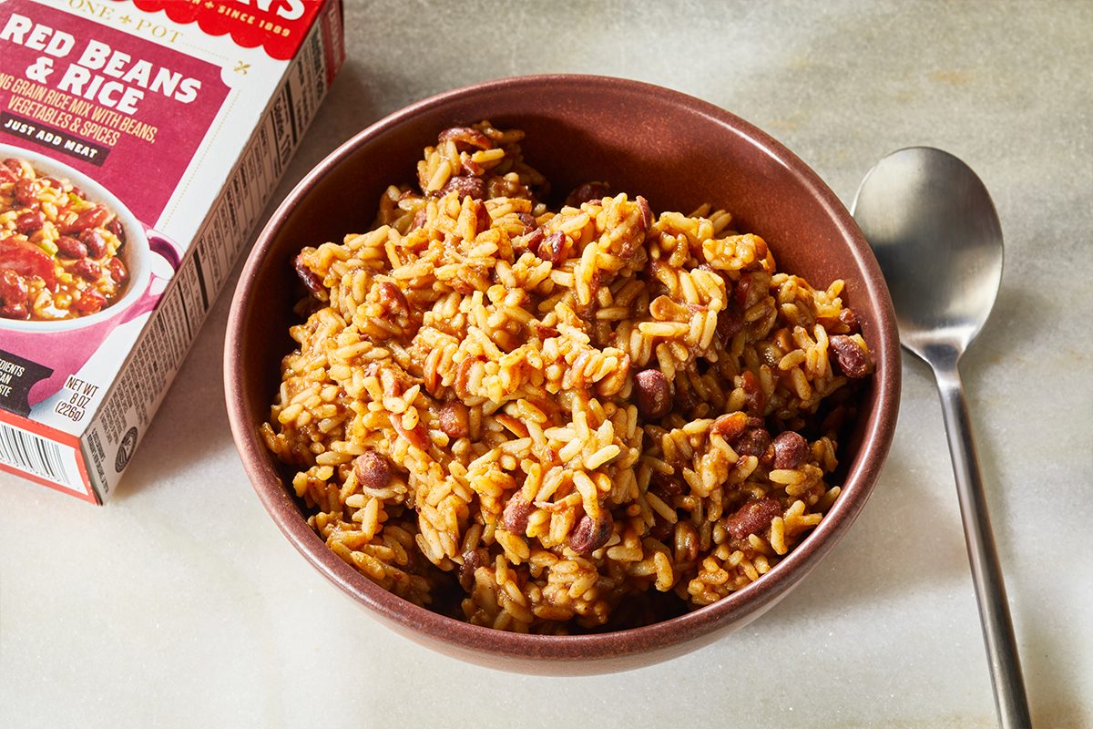 TOH, TOHD, TASTE OF HOME, TASTE OF HOME DIGITAL, ZATARAINS, RICE, STORE BOUGHT RICE MIX, JAMBALAYA, RED BEANS AND RICE, BLACK BEANS AND RICE, DIRTY RICE, GUMBO MIX, CREAMY BLACKENED CHICKEN, RICE IN BOWLS, SIDE DISHES, QUICK DINNERS FOR WORK NIGHT, QUICK MEALS, RICE ON MARBLE SURFACE, TAN TERRACOTTA BACKGROUND, ZATARAINS RICE MIXES,