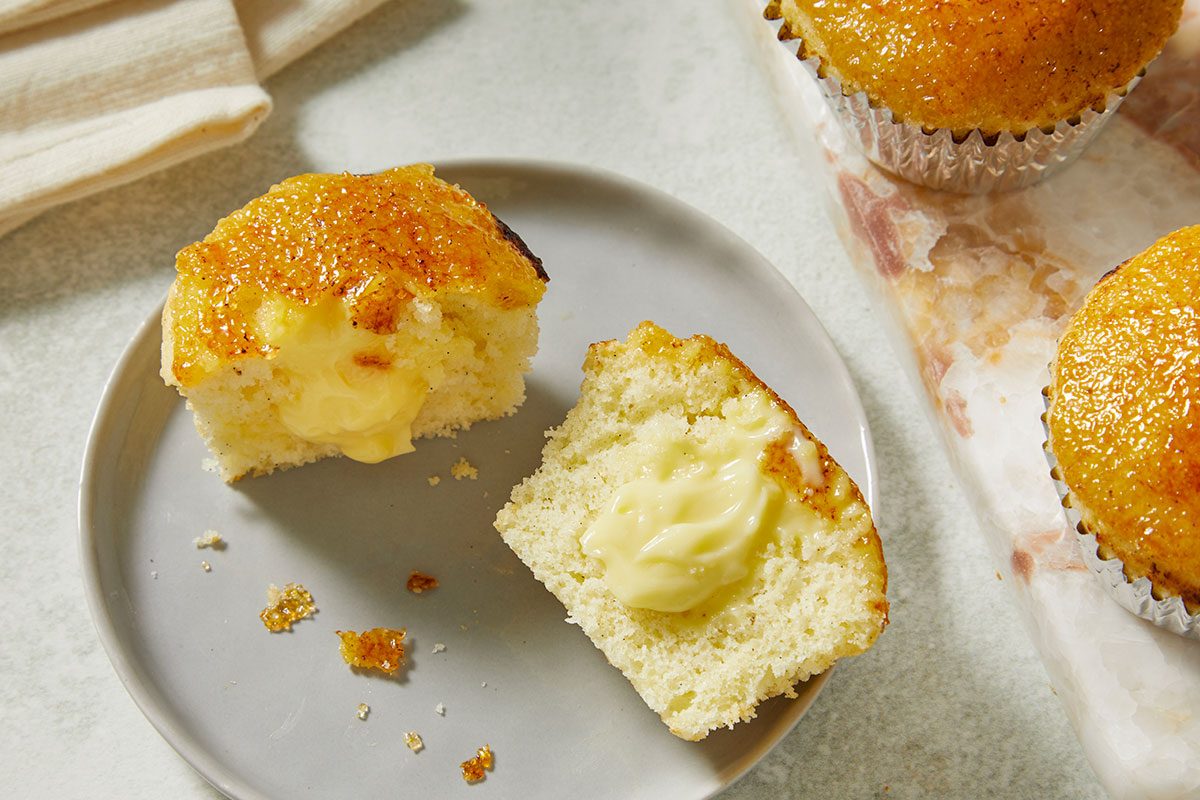 Overhead image of cupcakes with torched sugar topping, forming a golden, crackly caramelized crust over the creamy center.