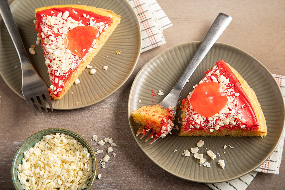 Overhead shot of prepared pizza cake slices served on a plate.