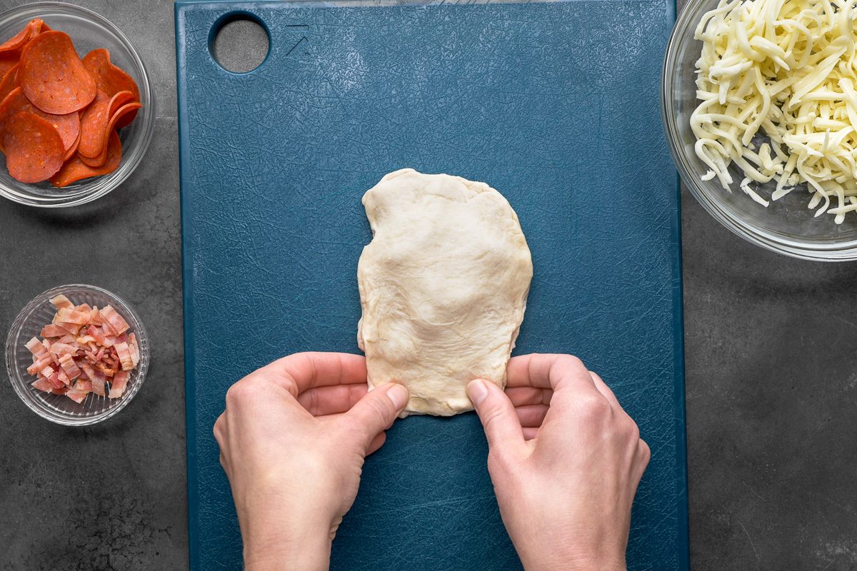 topping and sealing with a second biscuit