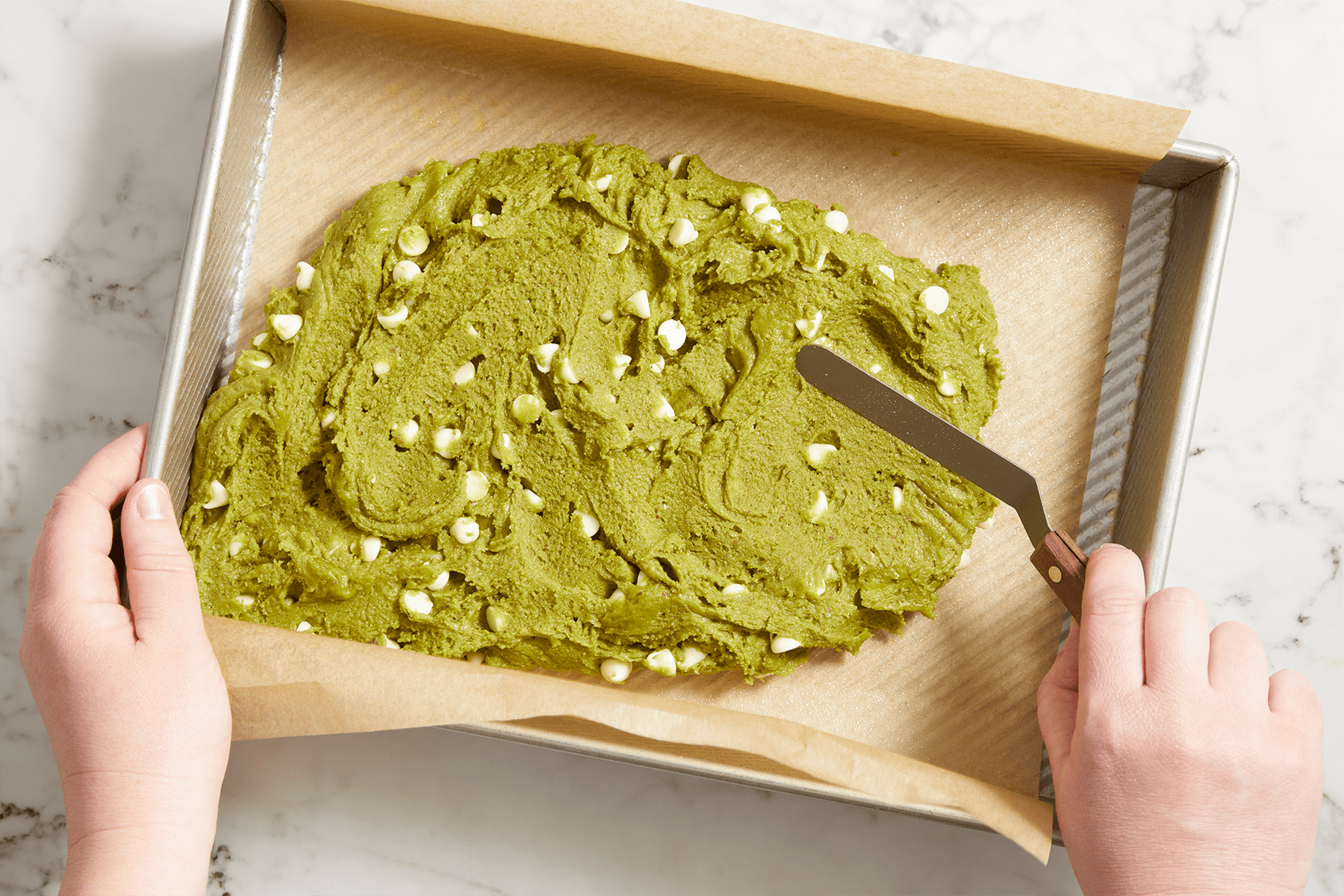 Spreading the macha batter
