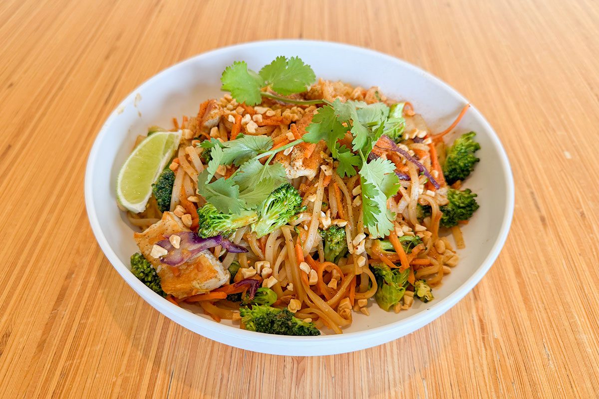 A noodle bowl served on a table, ready to eat