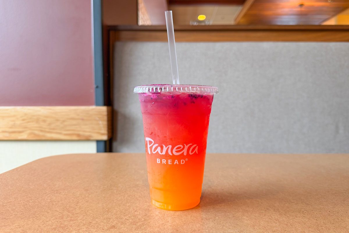 Panera's Dragonfruit Sunset Energy Refresher Drink on a Tbale, Ready to Drink