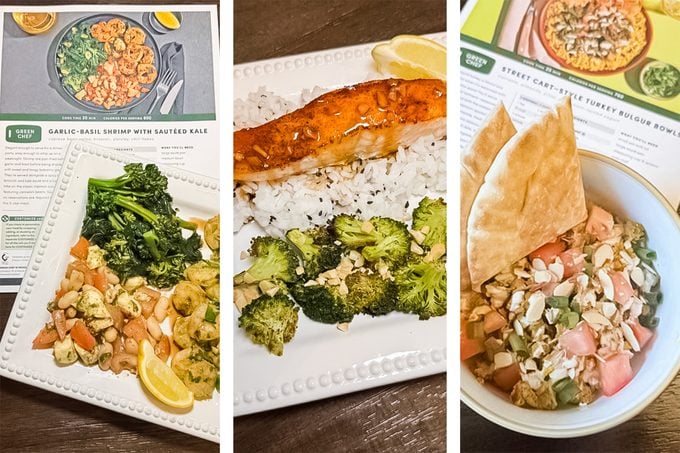 Three plated meals are shown: one with vegetables and chickpeas, another with salmon, rice, and broccoli, and a third bowl of soup with pita. Recipe cards are partially visible behind the dishes.